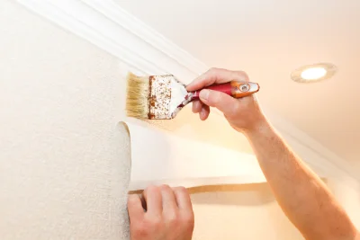 Pose de papier peint au Ségur — revêtements muraux et toiles de verre